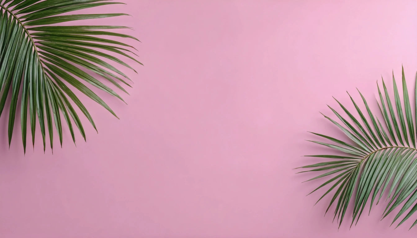 Green palm leaves in top left and bottom right corners against a pink background