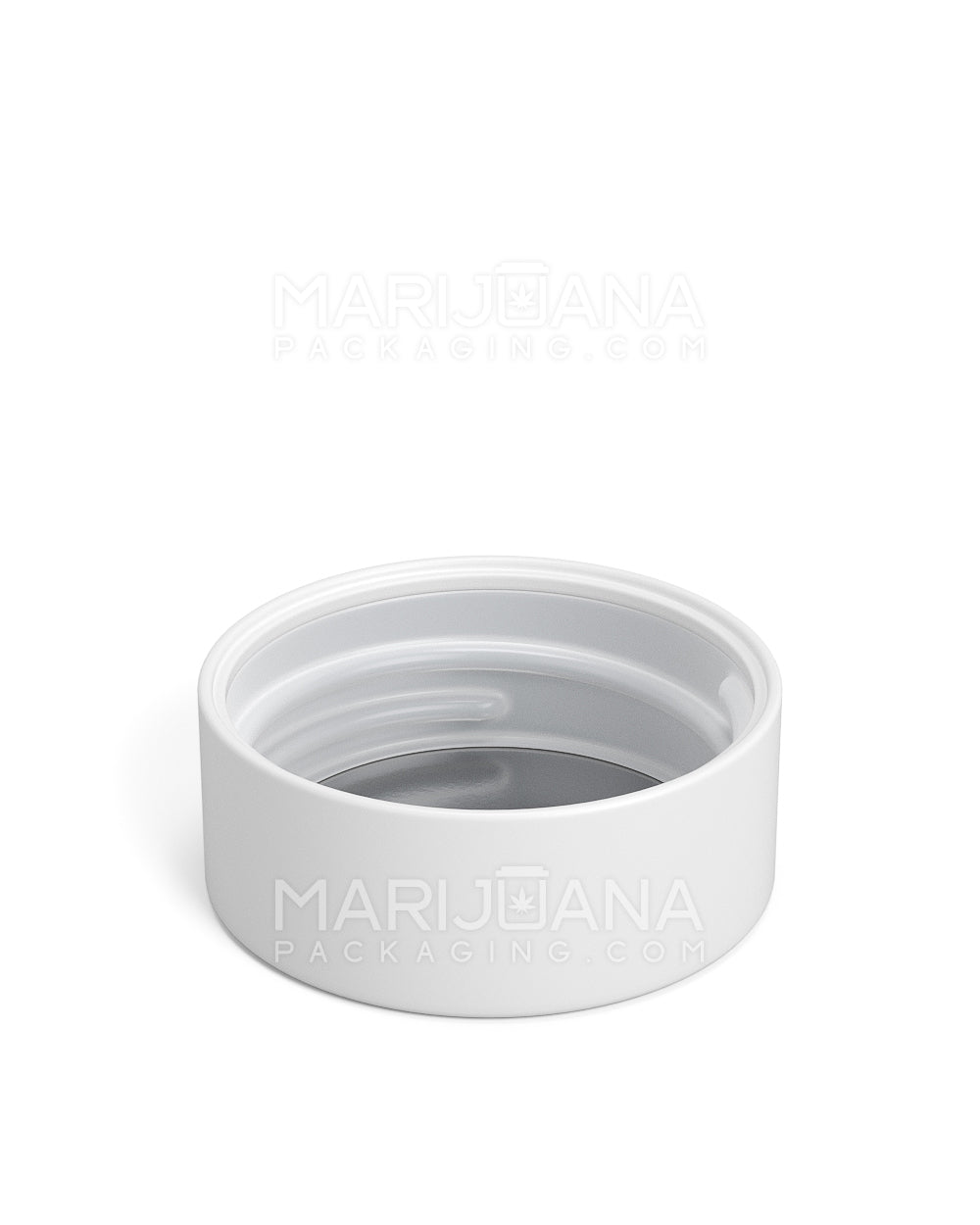 White plastic lid showing underneath