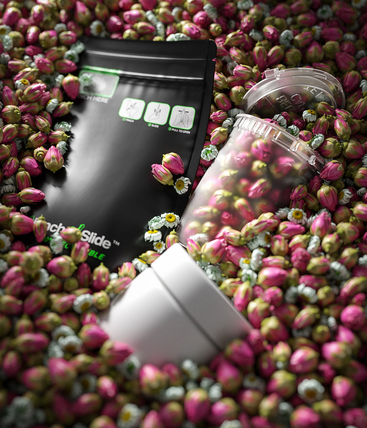 Matte black child-resistant mylar bag with white cannabis jar and pop top bottle in flower buds