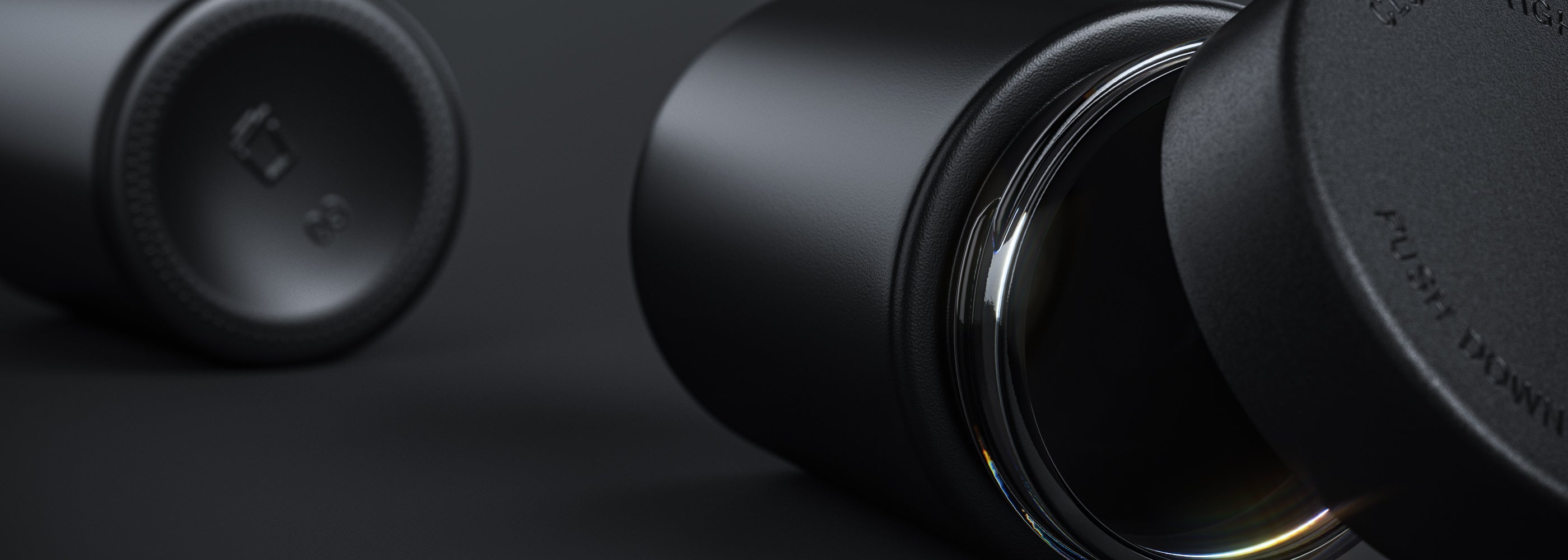 Matte black child-resistant glass cannabis jar lying on black surface