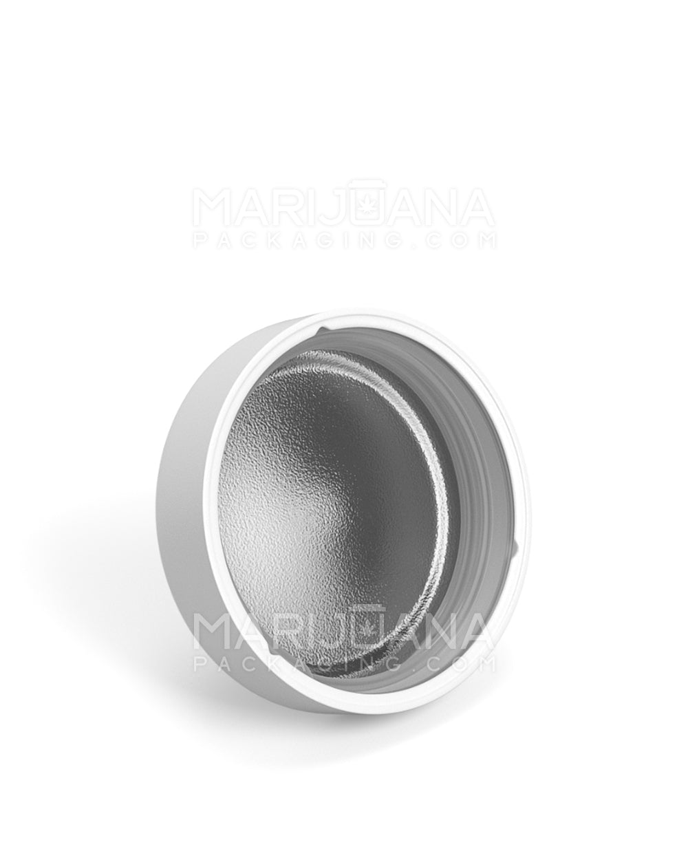 Matte white plastic lid with rounded top - side view showing inside foil liner