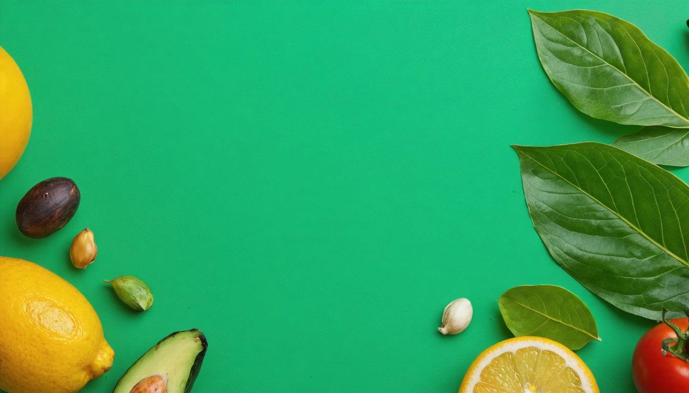 Lemons, avocado, nuts, and leaves scattered on a green background