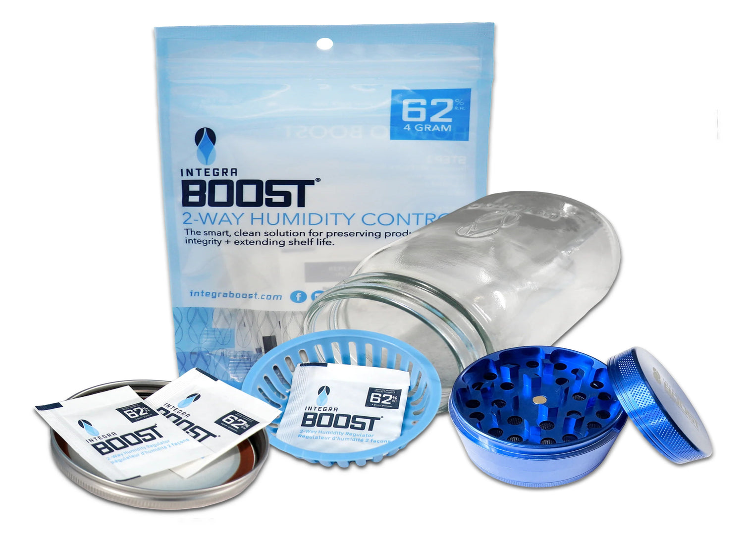 White packet labeled "Integra Boost" next to a small green plant with leaves and buds, on soil with a blurred leafy background