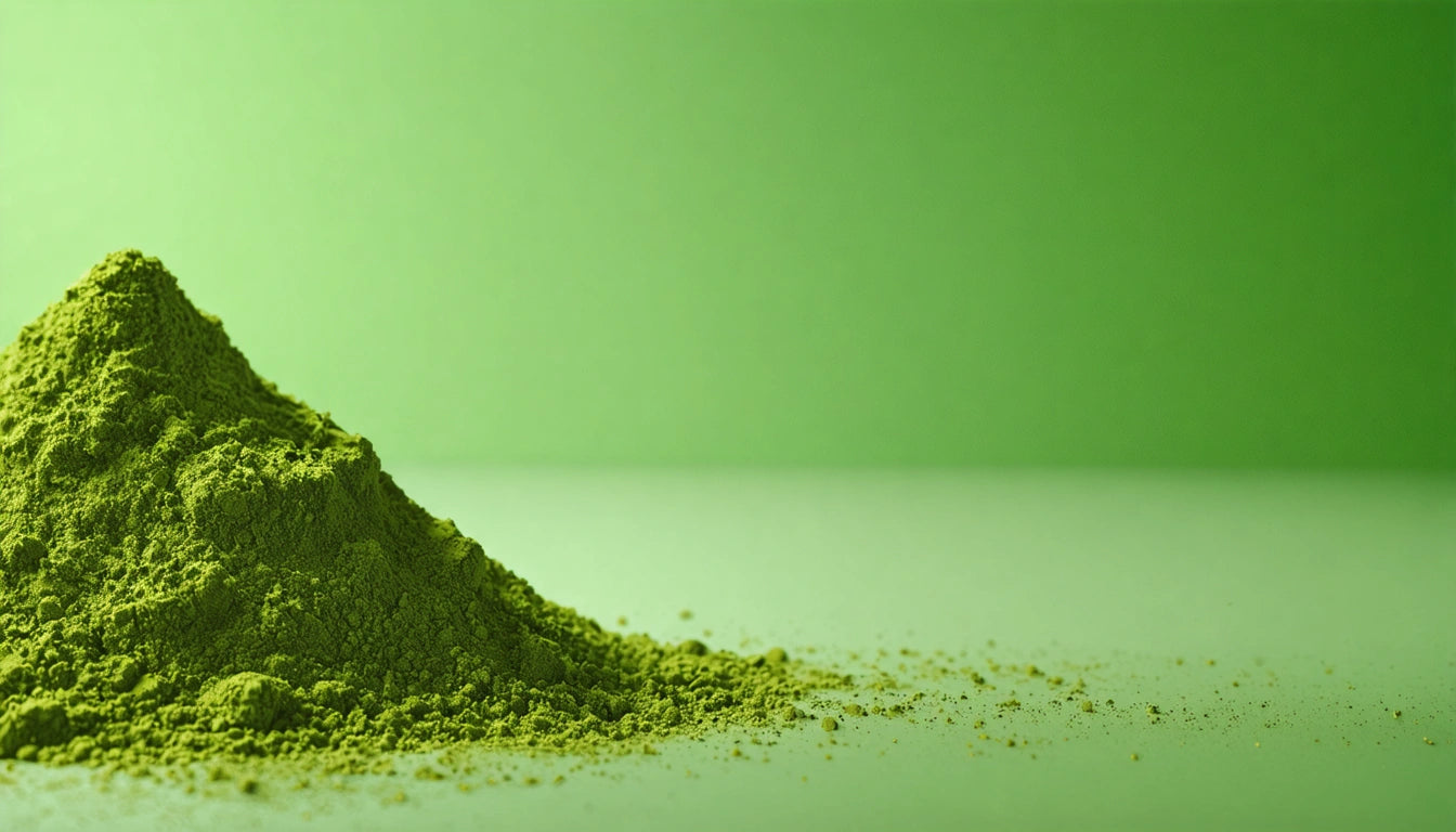 Green powder mound on a smooth surface, set against a gradient green background