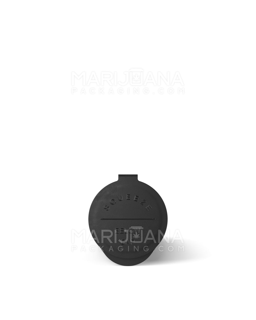 Closed black squeezetop plastic tube - top view.